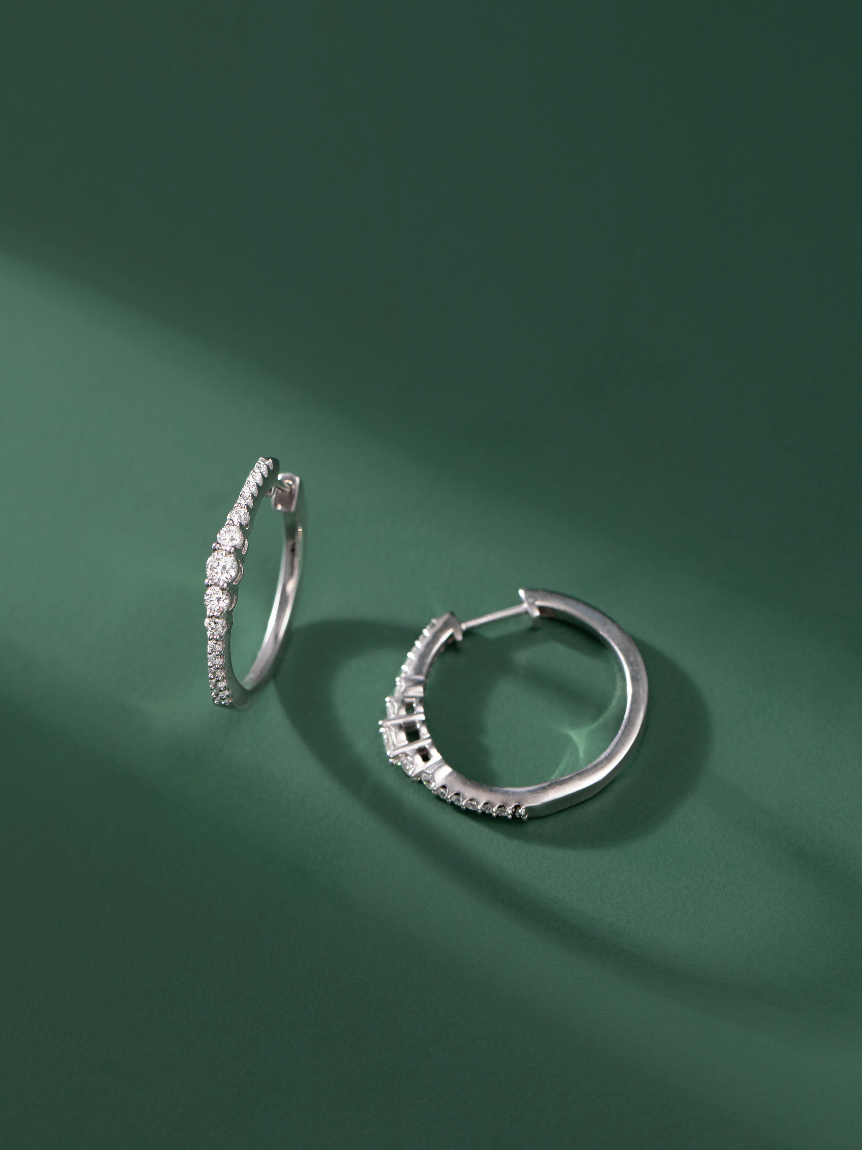Round Graduated Solitaire Earrings - Image 4